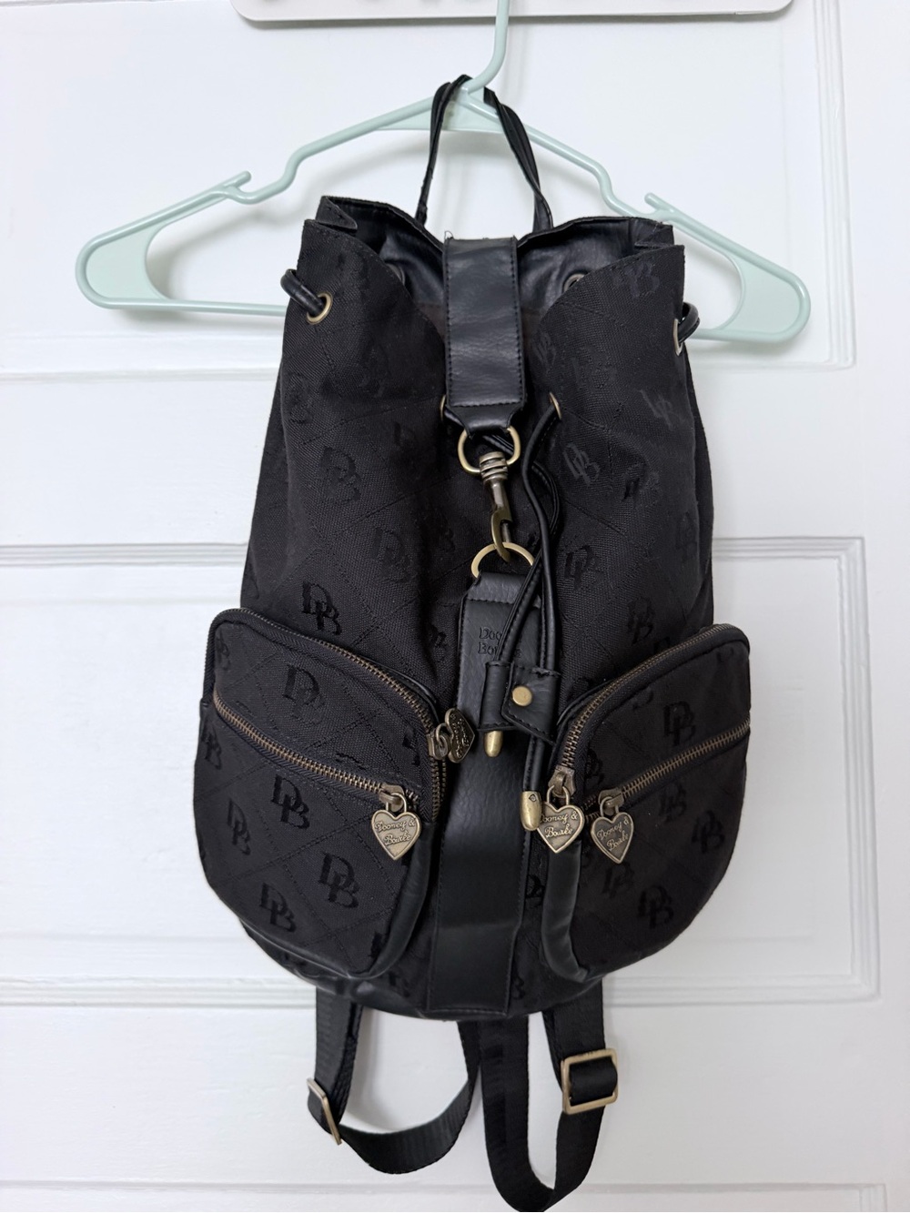 Dooney & Bourke Black Logo Drawstring Backpack with Heart Charm Zippers